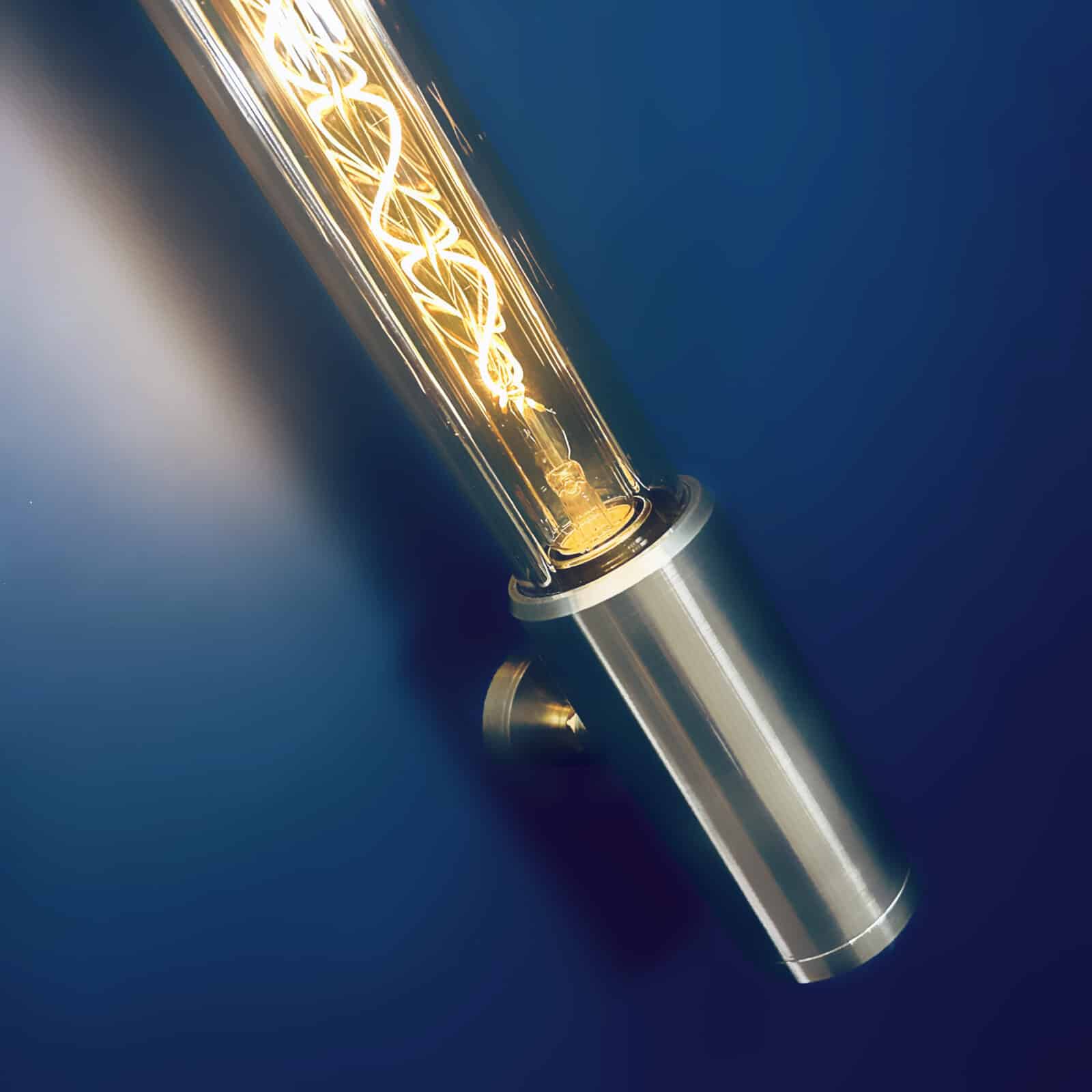 Aluminium and glass long wall lights designed and made in England fitted with Edison LED filament tubes. A modern industrial long wall light.