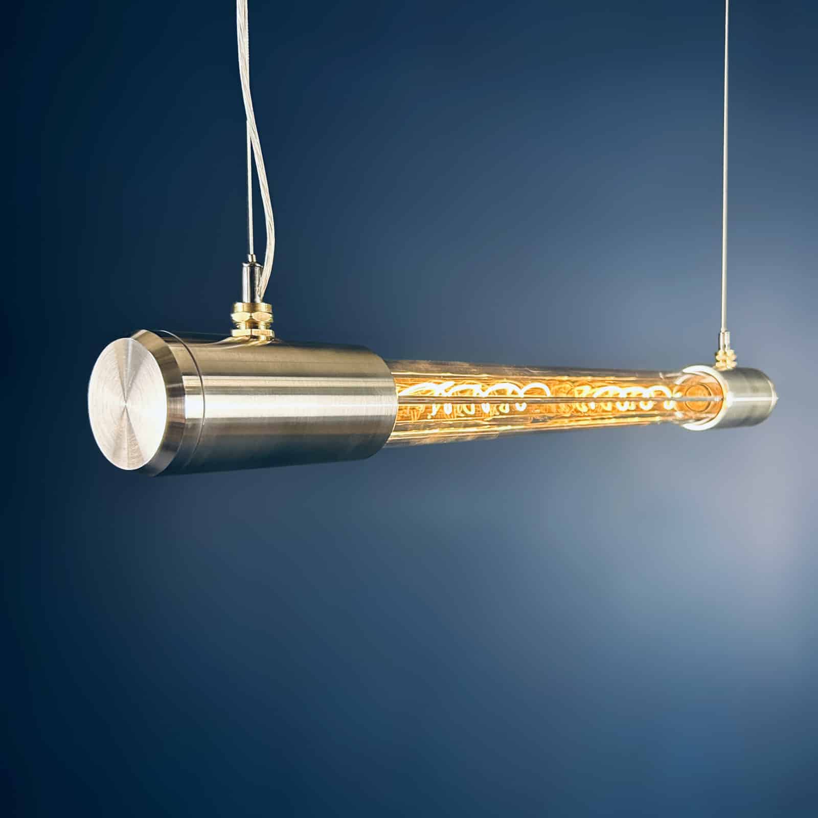 Shop for a industrial style linear ceiling light, installed with Edison LED filament tubes. British designed and made. Manufactured with high quality materials aluminium and glass.